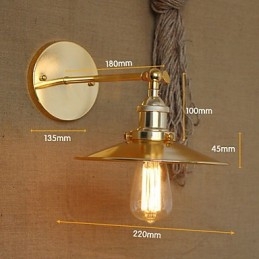 וילה בסגנון תעשייתי מינימליסטי נוסטלגית מטריית זהב מול הקיר המעוטר במעבר הכנסייה